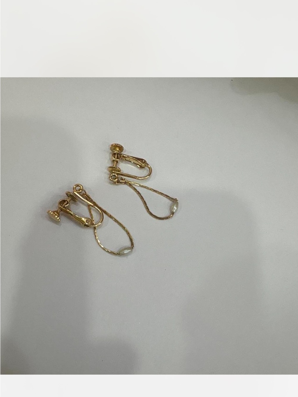 Gold Teardrop Clip-On Earrings with Clear Accent Bead